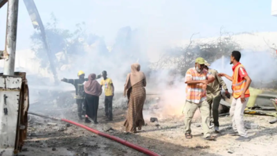An African Union military helicopter crashes in Somalia's capital, killing at least 3