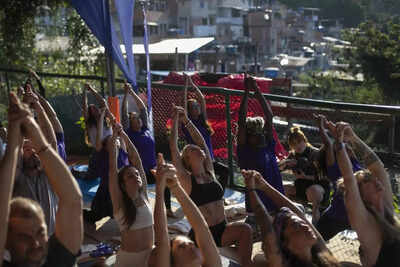 Yoga fever in Brazil: Dozens gather in Rio slum to train; free program targets low-income communities