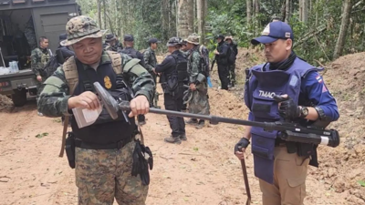Border dispute heats up (AP photo) Thailand-Cambodia border clashes escalate: 14 dead, over 100,000 flee amid the violence; airstrikes, artillery rock region