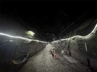 Rescue workers in Chile find the body of one of 5 miners trapped in a copper mine