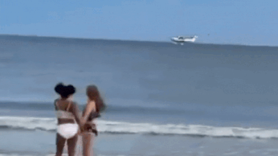 Viral video: Small plane crashes into ocean near Oak Island Pier; onlookers from nearby beach watch in shock