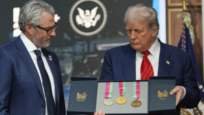 US President Donald Trump presented with Olympic medals from the 1984 LA Games by Casey Wasserman, chairman of the LA28 organising committee (Image credits: AP) 'Can I say I won them athletically': Trump jokes after receiving 1984 Olympic medals; prepares for 2028 games with new task force