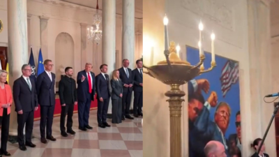 ‘Not a great day’: Donald Trump displays artwork of Butler attack to European leaders - video