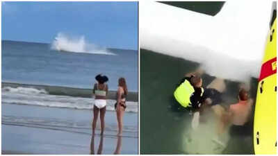 'Oh my God!' Pilot rescued in 30 seconds after dramatic plane crash off Oak Island- Watch