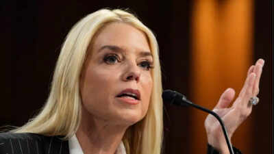 Pam Bondi fires DOJ paralegal Elizabeth Baxter accused of obscene gestures at National Guard
