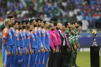 Pakistan and Indian players stand for national anthem before the start of the Asia Cup cricket match between India and Pakistan at Dubai International Cricket Stadium in Dubai,United Arab Emirates, Sunday, Sept. 21, 2025. (AP Photo/Altaf Qadri) Dubai Police stern warning to fans ahead of India-Pakistan Asia Cup final: Strict rules, banned items, Rs 7 lakh fine, jail penalties!