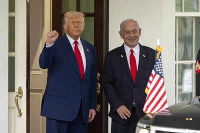 FILE - President Donald Trump, left, stands with Israel's Prime Minister Benjamin Netanyahu at the West Wing of the White House, April 7, 2025, in Washington. (AP Photo/Mark Schiefelbein, File) Trump admin proposes $6 billion arms sale to ally; package includes Apache helicopters, assault vehicles - report