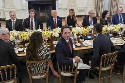 US president Donald Trump hosts a dinner with first lady Melania Trump in the State Dinning Room of the White House, Thursday (AP photos) Tim Cook, Sundar Pichai and more: Donald Trump hosts tech giants at White House dinner; Elon Musk absent