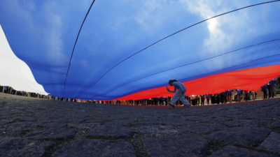 Russian Flag (Image credits: AP) Glitter and Soviet nostalgia: Russia revives Eurovision rival contest