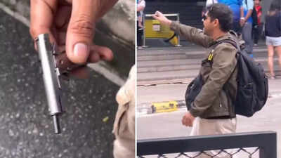 Screengrab of viral video (Images/X) Bangkok: Indian origin man threatens public with gun-shaped lighter; arrested