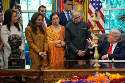 President Donald Trump speaks during a Diwali celebration in the Oval Office at the White House, Tuesday, Oct. 21, 2025, in Washington. At left is Director of National Intelligence Tulsi Gabbard. (AP Photo/Manuel Balce Ceneta) Explained: Why four US Congressmen have written to Rutgers over a 'Hindutva in America' event