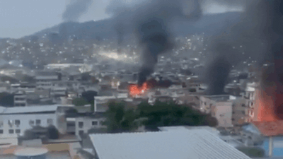 Smoke over Rio de Janeiro: Deadly anti-gang raid leaves 64 dead, including 4 police officers — watch video
