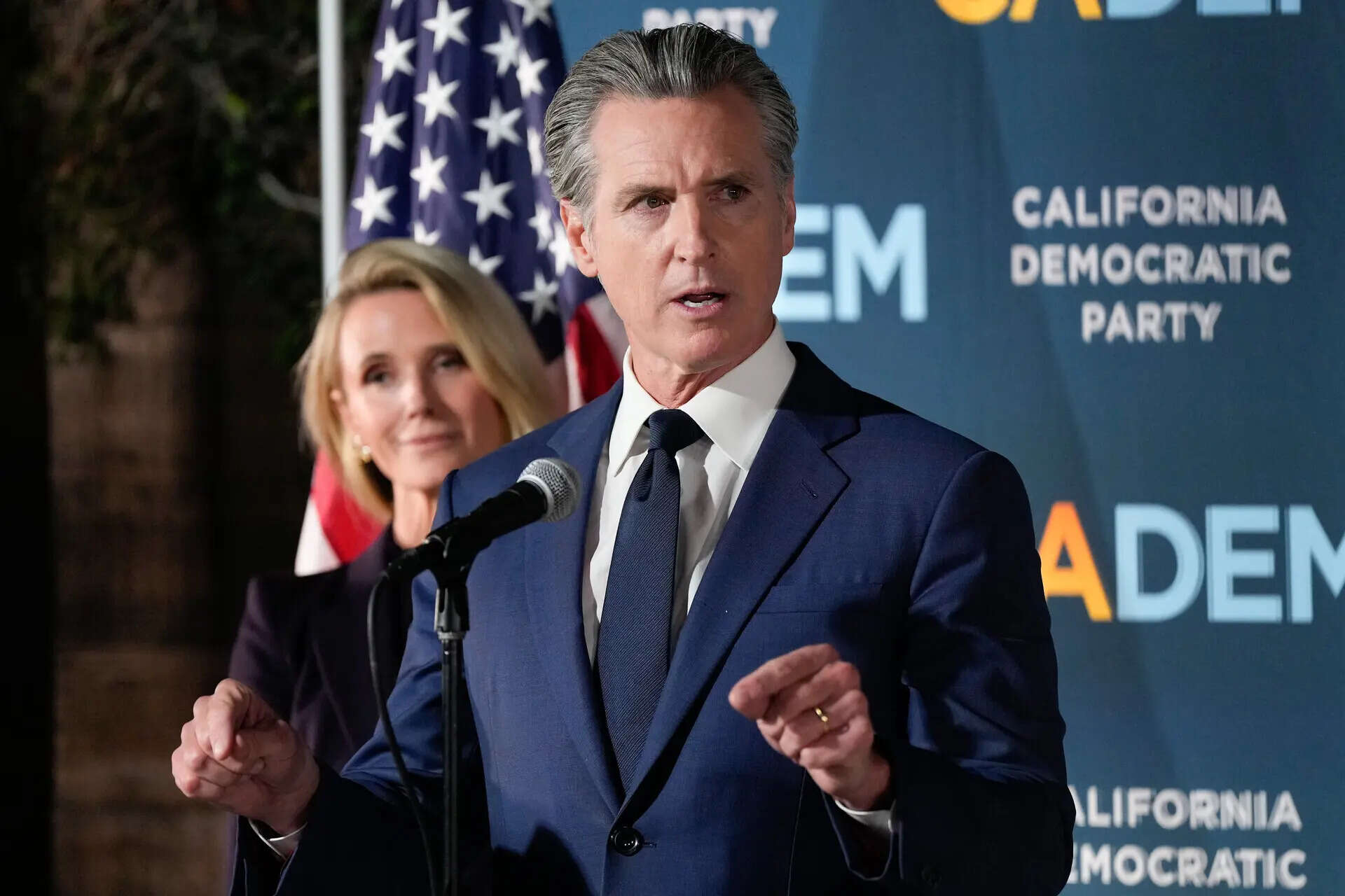 California Gov. Gavin Newsom speaks as he stands with first partner Jennifer Siebel Newsom during an election night press conference at a California Democratic Party office Tuesday, Nov. 4, 2025, in Sacramento, Calif. (AP Photo/Godofredo A. Vásquez) Election 2025 Redistricting California