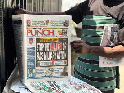 A vendor sells local newspapers with headlines referring to US President Donald Trump's comments about Nigeria, on the street of Lagos, Nigeria, Sunday, Nov. 2, 2025. (AP Photo/Sunday Alamba) 'Not a religiously intolerant country': Nigeria rejects Trump's claim over attacks on Christians; US president threatened military action