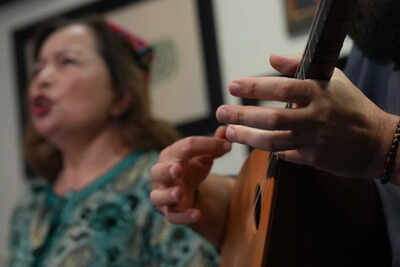 Members of the London Uyghur Ensemble perform during an interview with The Associated Press in London, Wednesday, Oct. 8, 2025. (AP Photo/Joanna Chan) Report: China threatens detention in Xinjiang over banned Uyghur songs