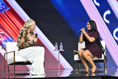 Erika Kirk, left, and Nicki Minaj speak during Turning Point USA's AmericaFest 2025 ‘Fits right in with MAGA’: Nicki Minaj faces backlash over ‘boys will be boys’ remark; netizens discover husband's 'sex offender' past