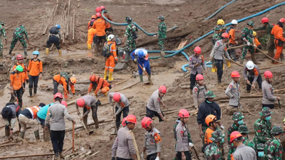 <p>Photo released by Indonesia’s National Disaster Management Agency (BNPB) rescuers search for victims in Pasir Langu village after a landslide, in West Bandung district of West Java province, Indonesia, Monday (Credit: AP)</p>
<p>” decoding=”async” fetchpriority=”high”></p>
</div>
<div>
<p><span title= Villages buried, dozens trapped: 34 killed in Indonesia landslides