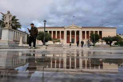 FILE - The headquarters of Athens University stands after a rainfall in Athens, on Monday, Jan. 13, 2025. (AP Photo/Petros Giannakouris, File) Greece abolishes long study breaks, cutting student population by half