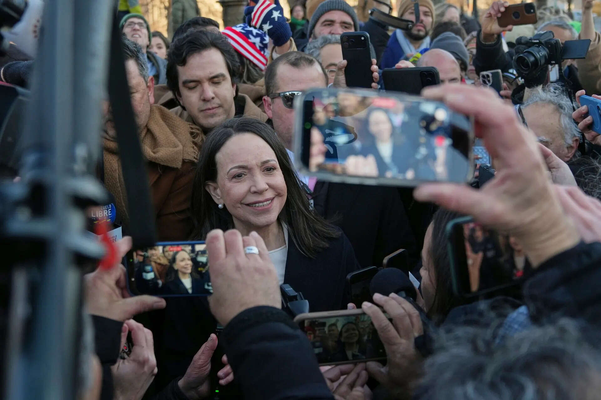Venezuelan opposition leader María Corina Machado, center, leaves the Capitol, Thursday, Jan. 15, 2026, in Washington. (AP Photo/Allison Robbert) Venezuela's Machado says she presented her Nobel Peace Prize to Trump during their meeting