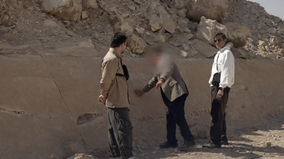 Egyptian authorities arrested a tour guide after a viral video showed him drawing on the Pyramid of Unas in Saqqara/Image: Screenshot of X video Tour guide arrested in Egypt after viral video shows him 'sketching' on 4,000-year-old pyramid