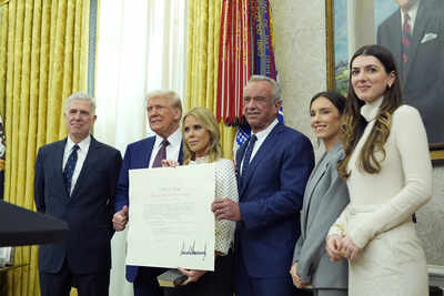 President Donald Trump and Supreme Court Associate Justice Neil Gorsuch stand with Robert F. Kennedy Jr., his wife Cheryl Hines, and other family members, with his commission, before he is sworn in as Health and Human Services Secretary in the Oval Office at the White House, in Washington. (AP/PTI) Tariff ruling: Meet the Trump-appointed Supreme Court judges who went against him