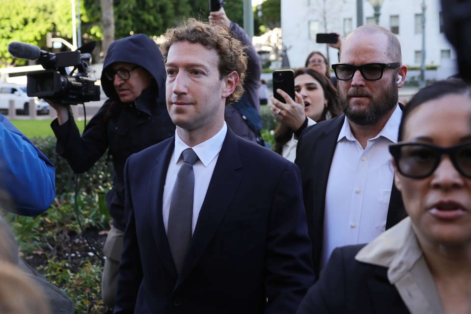 Meta CEO Mark Zuckerberg arrives for a landmark trial over whether social media platforms deliberately addict and harm children, Wednesday, Feb. 18, 2026, in Los Angeles. (AP Photo/Ryan Sun) Zuckerberg testifies at trial accusing social media firms of addicting kids to their platforms