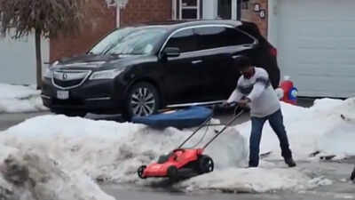 Video of Brampton man clearing snow with lawnmower goes viral: 'Not the best and brightest'