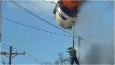 Watch: Louisiana worker dangling from fiery cherry picker before plunging to ground