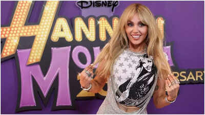 ‘She got money and moved next door’: Miley Cyrus jokes 'superfan' Alex Cooper is 'kinda creepy' at Hannah Montana 20th anniversary special