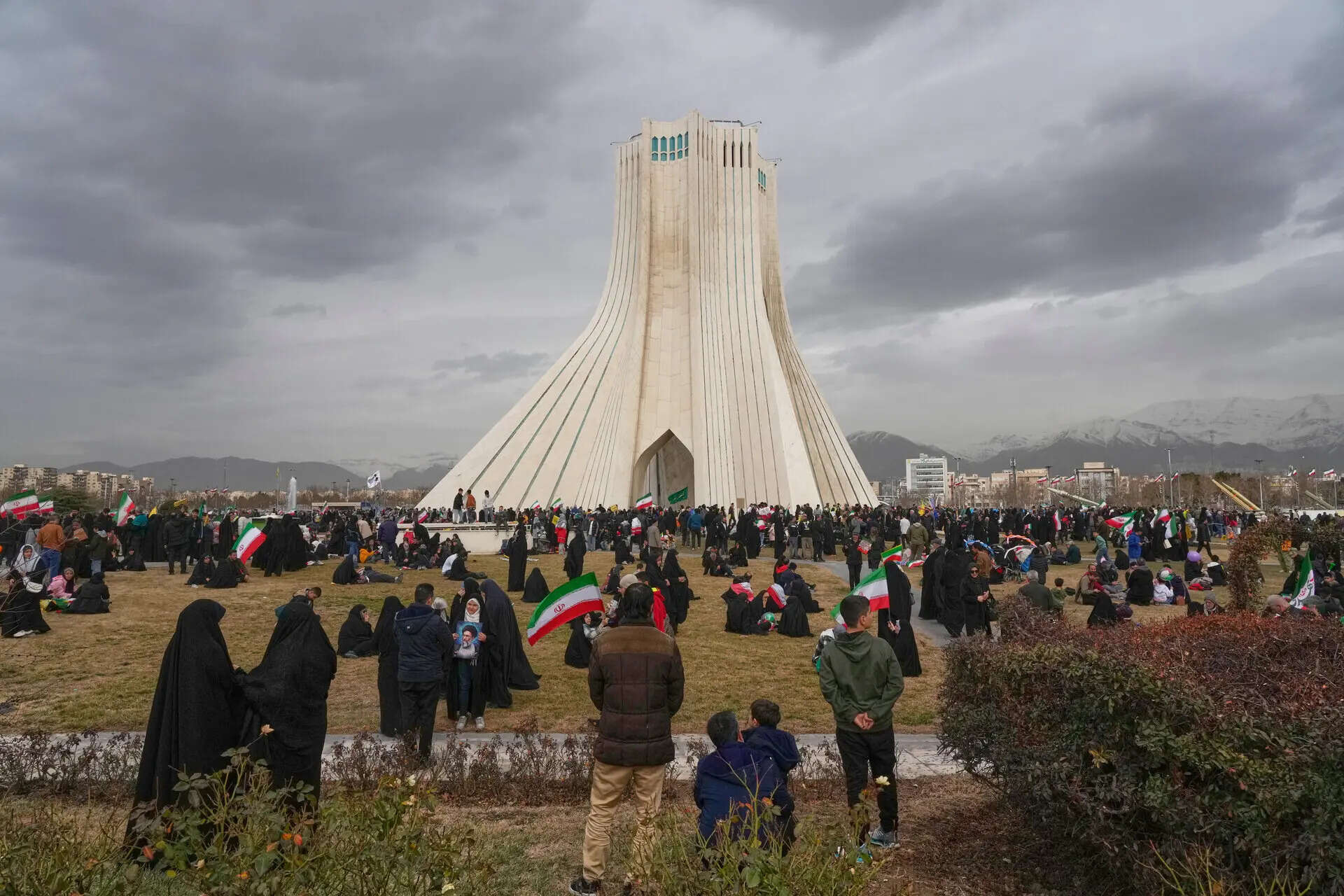 People attend an annual rally marking 1979 Islamic Revolution as they gather around the Azadi (Freedom) monument tower in Tehran, Iran, Wednesday, Feb. 11, 2026. (AP Photo/Vahid Salemi) Photos show the Tehran rally marking the anniversary of Iran’s 1979 Islamic Revolution