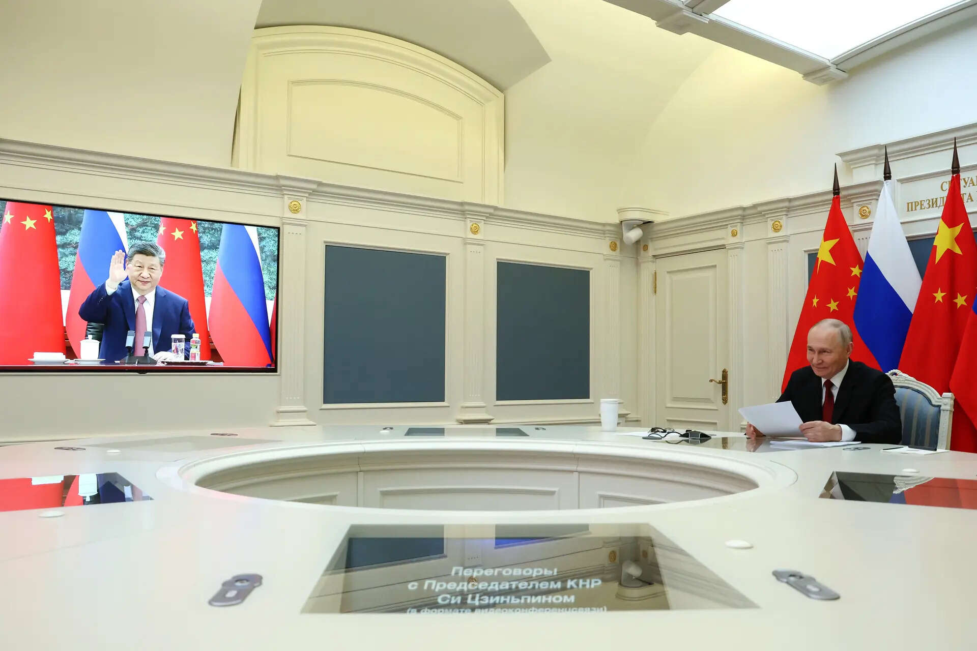 Russian President Vladimir Putin speaks with Chinese President Xi Jinping via videoconference at the Kremlin in Moscow, Wednesday, Feb. 4, 2026. (Vyacheslav Prokofyev/Sputnik, Kremlin Pool Photo via AP) Russia China