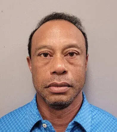 This handout photo provided by the Martin County Sheriff's Office shows Tiger Woods, in Stuart, Fla., Friday, March 27, 2026. (Martin County Sheriff's Office via AP) Tiger Woods had hydrocodone pills in his pocket and bloodshot eyes at crash scene, authorities say