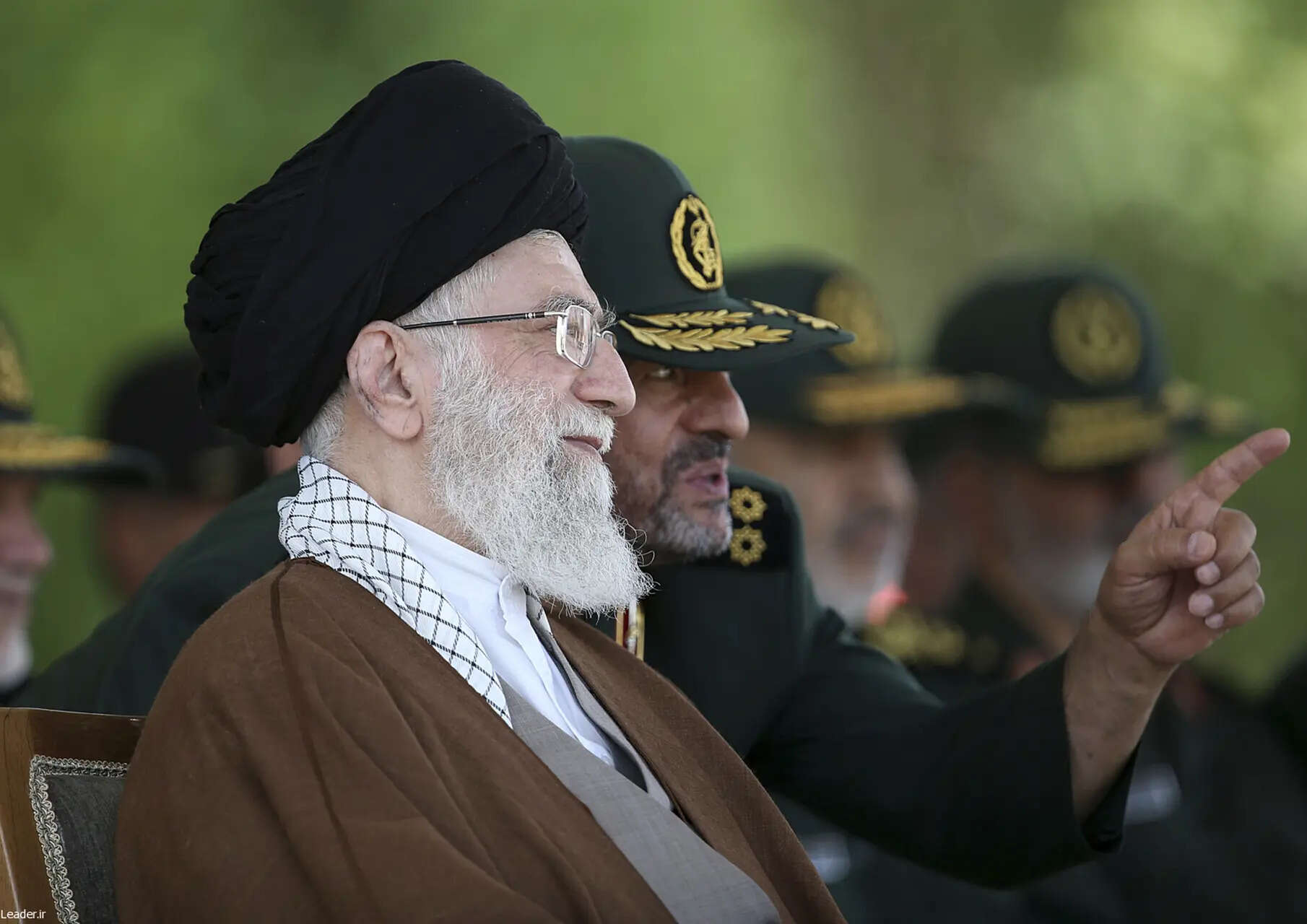 FILE- In this picture released by the official website of the office of the Iranian supreme leader, Supreme Leader Ayatollah Ali Khamenei listens to the then commander of the Revolutionary Guard Mohammad Ali Jafari during a graduation ceremony of a group of the guard's officers in Tehran, Iran, May 20, 2015. (Office of the Iranian Supreme Leader via AP, File) What to know about Iran's Revolutionary Guard, a powerful force within the country's theocracy