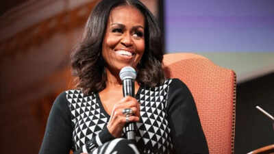 Quote of the day by Michelle Obama: “We should always have three friends in our lives-one who walks ahead who we look up to and follow; one who walks beside us, who is with us every step of our journey; and then, one who we reach back for and bring along after we've cleared the way.”