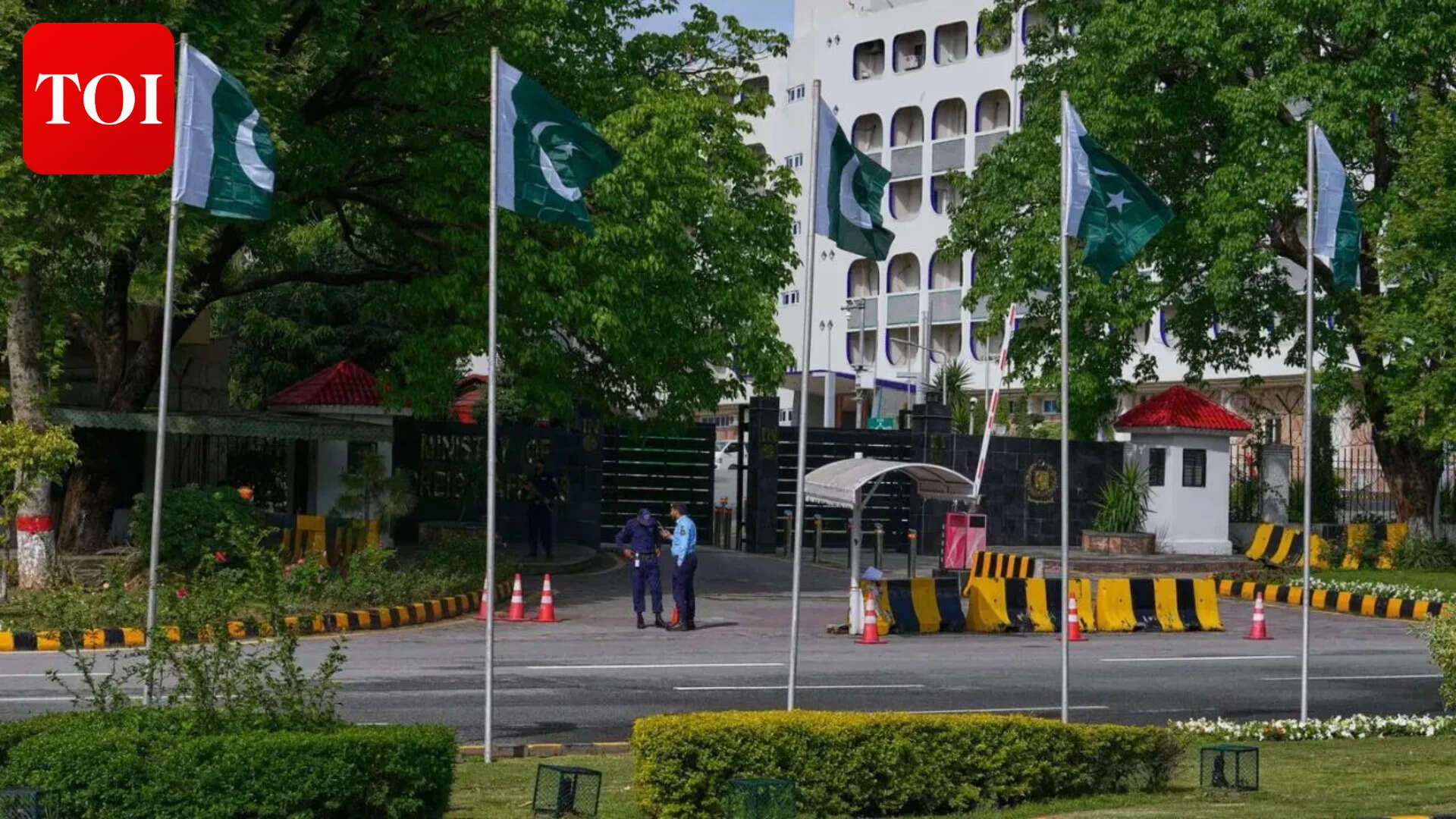 Security officers stand guard at the main entrance of Pakistan's foreign ministry to ensure security ahead of the United States and Iran negotiations
