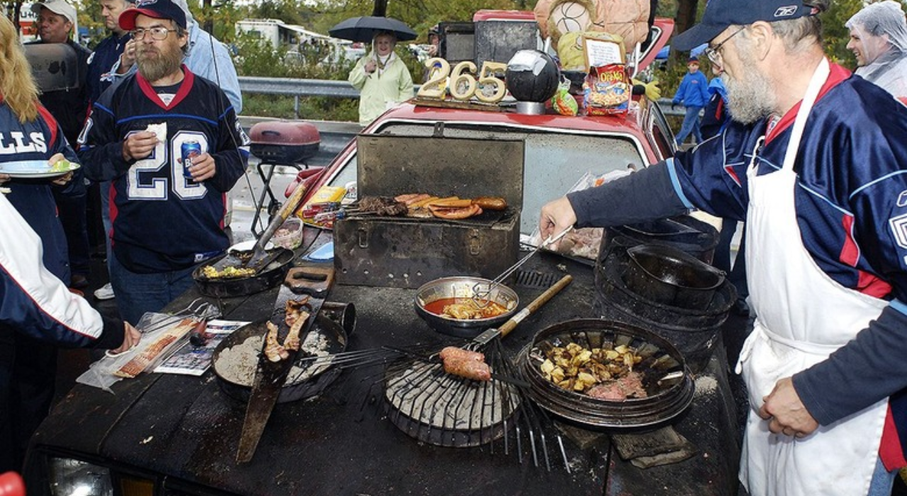 Tailgating involves pre-match gatherings in stadium parking lots with grills, food, drinks and fan rituals./ image: AP Photo/Don Heupel Tailgating involves pre-match gatherings in stadium parking lots with grills, food, drinks and fan rituals.
