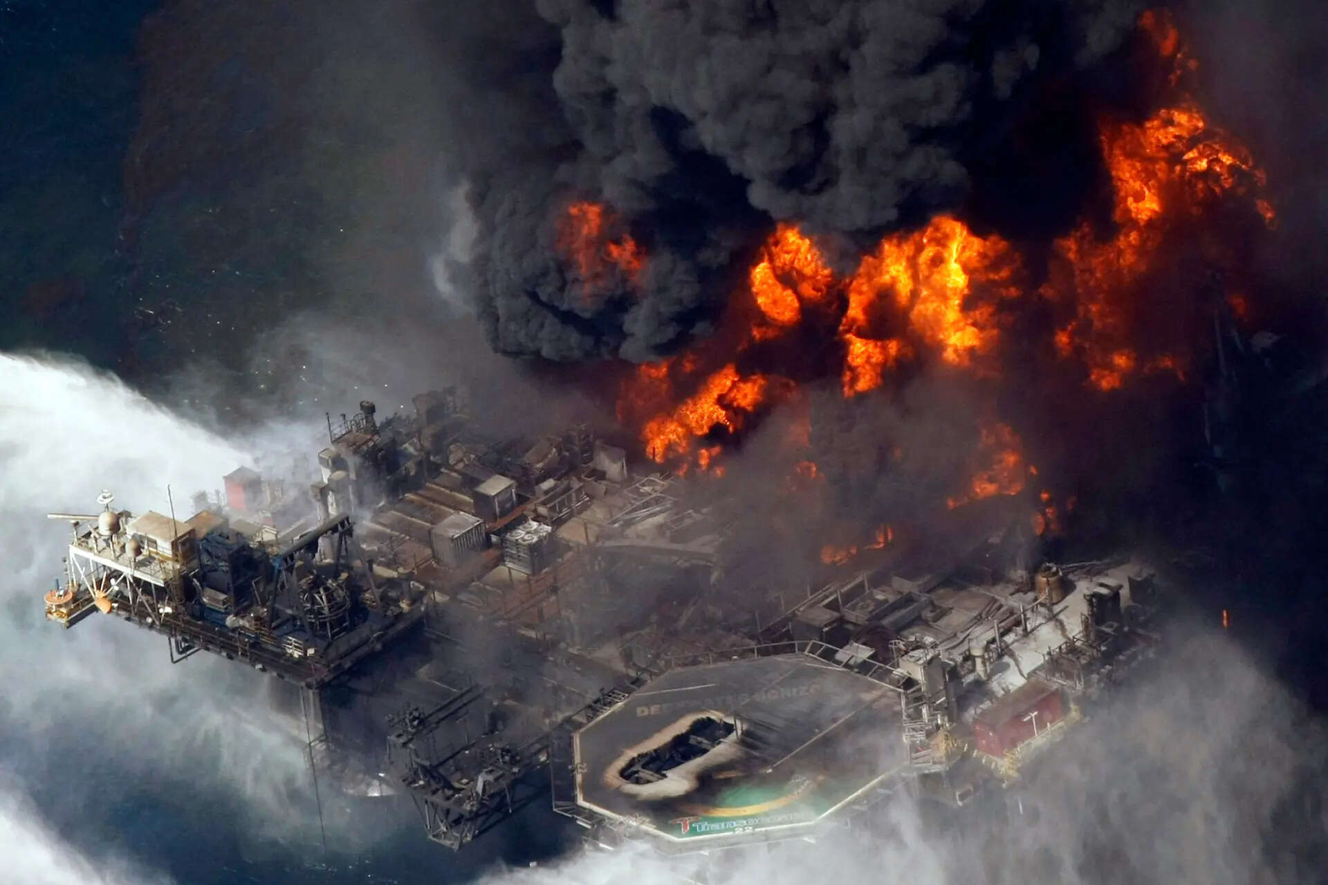 FILE - The Deepwater Horizon oil rig burns, April 21, 2010, in the Gulf of Mexico more than 50 miles southeast of Venice, La. (AP Photo/Gerald Herbert, File) Trump administration to rejoin offshore drilling agencies separated after 2010 Gulf oil spill