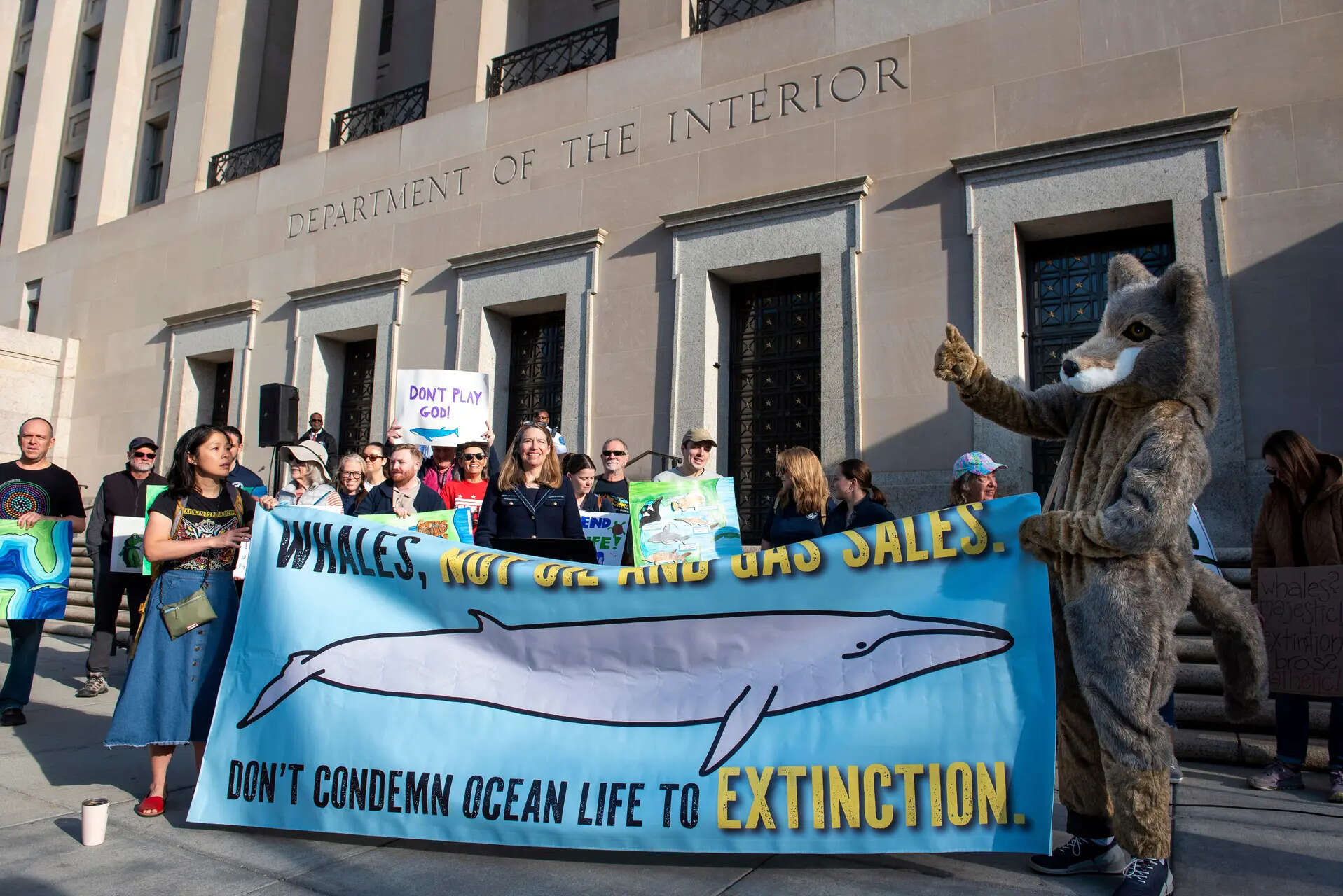 Conservation groups rally to oppose the Trump administration's convening of the Endangered Species Committee, at the Interior Department in Washington, Tuesday, March 31, 2026. (AP Photo/Cliff Owen) Trump Oil God Squad