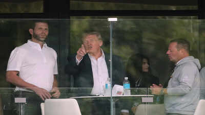 Eric Trump, President Donald Trump and Larry Glick watch the Maaden LIV Golf tournament at Trump National Golf Club, in Sterling, Va. AP/PTI(AP05_10_2026_000001A) TACO abroad, boss at home: Trump may be losing against China or Iran, but still controls MAGA