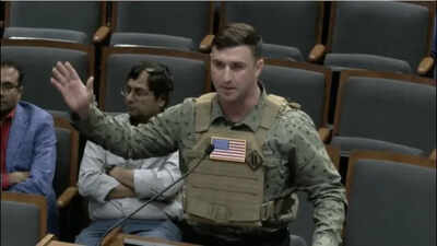 Jan 6 rioter Jacob Lang speaking against Hindus, Jains and Muslims -- at the Frisco City Council meeting. 'Hindus and Muslims teaming up to take over Texas': Jan 6 rioter's hate speech at Frisco council meeting