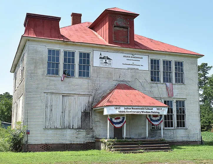 These schools became community hubs, fostering literacy and self-respect. Though many are gone, their legacy highlights community power in overcoming systemic neglect. Image Credit: Wikimedia Commons Julius_Rosenwald_High_School_2019