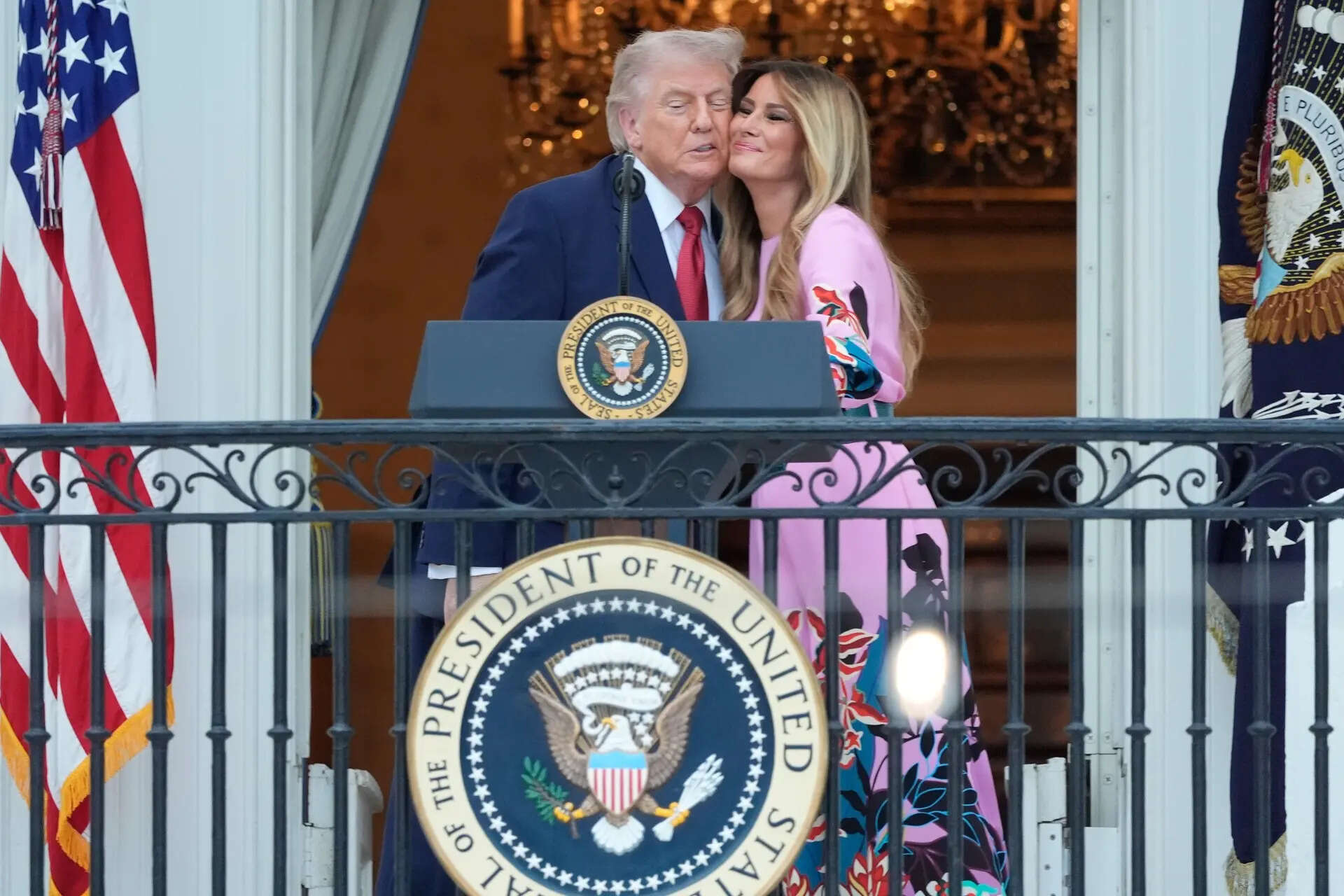 President Donald Trump with first lady Melania Trump as they give remarks to guests on the South Lawn of the White House in Washington for the Congressional Picnic, Tuesday, May 19, 2026. (AP Photo/Manuel Balce Ceneta) Trump