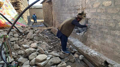 Villagers examine damages due to overnight cross border fighting between Pakistan and Afghan forces, at a village in Bajaur, a district of Pakistan's Khyber Pakhtunkhwa province bordering with Afghanistan, Friday, Feb. 27, 2026. (AP Photo) Pakistan bombs Afghanistan again: Taliban claims 11 children among 13 killed
