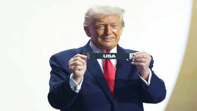 President Donald Trump smiles after drawing USA's name from a pot during the draw for the 2026 soccer World Cup at the Kennedy Center in Washington, Friday, Dec. 5, 2025. (Dan Mullan/Pool Photo via AP) Trump's message to USNMT revealed as president calls squad before FIFA World Cup 2026 opener against Paraguay